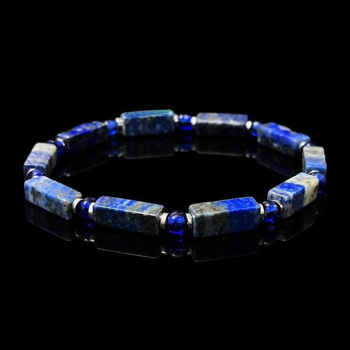 Lapis Lazuli square bead bracelet on elastic cord, featuring deep blue stones for Throat Chakra wisdom and expression.