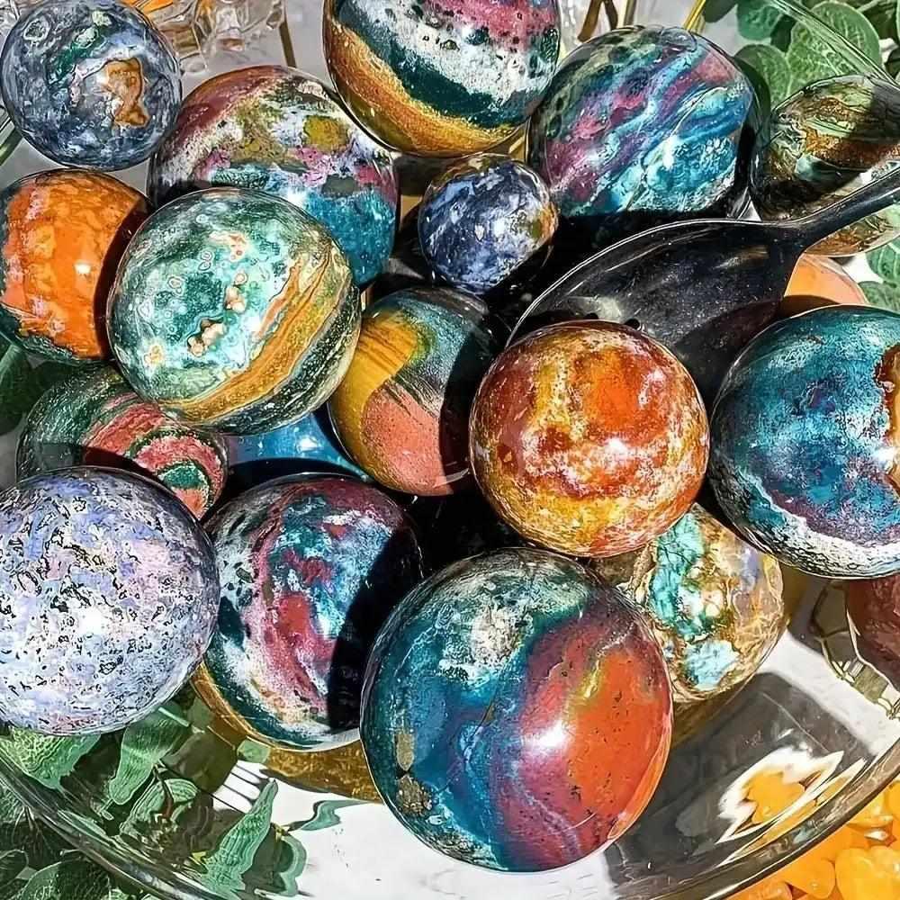 Large Ocean Jasper spheres featuring swirling green, pink, and blue orbs to radiate calm, joy, and emotional healing energy.