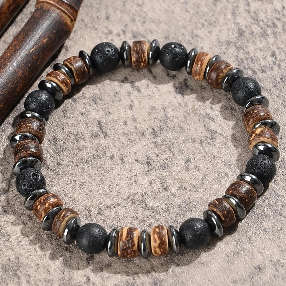 Men's Lava Stone, Wood, and Hematite Beaded Bracelet. Grounding volcanic lava, warm wood, and cool hematite beads.