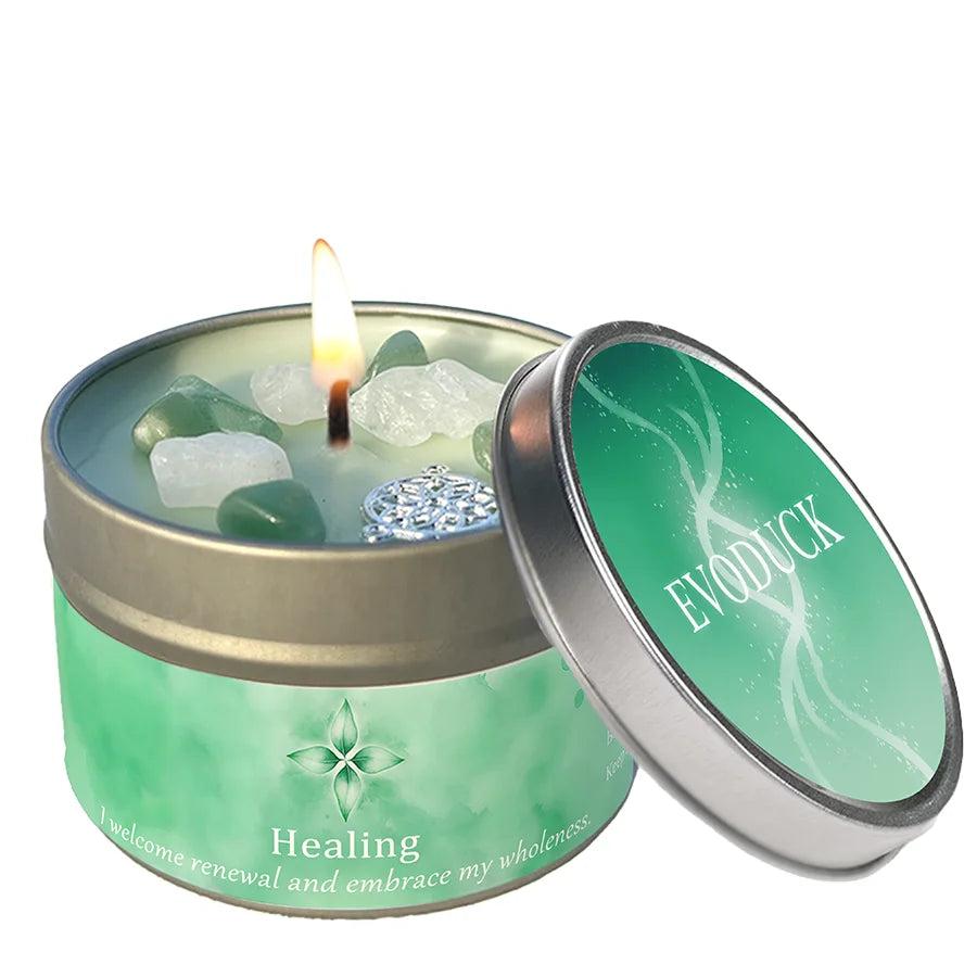 Healing Lemon Peppermint intention candle with green aventurine and clear quartz crystals in a tin.