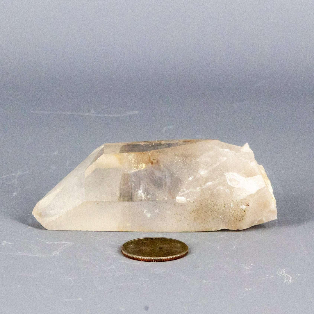 Clear Lemurian Seed Quartz Point, 3.5" long, with horizontal striations for ancient wisdom and high vibration.