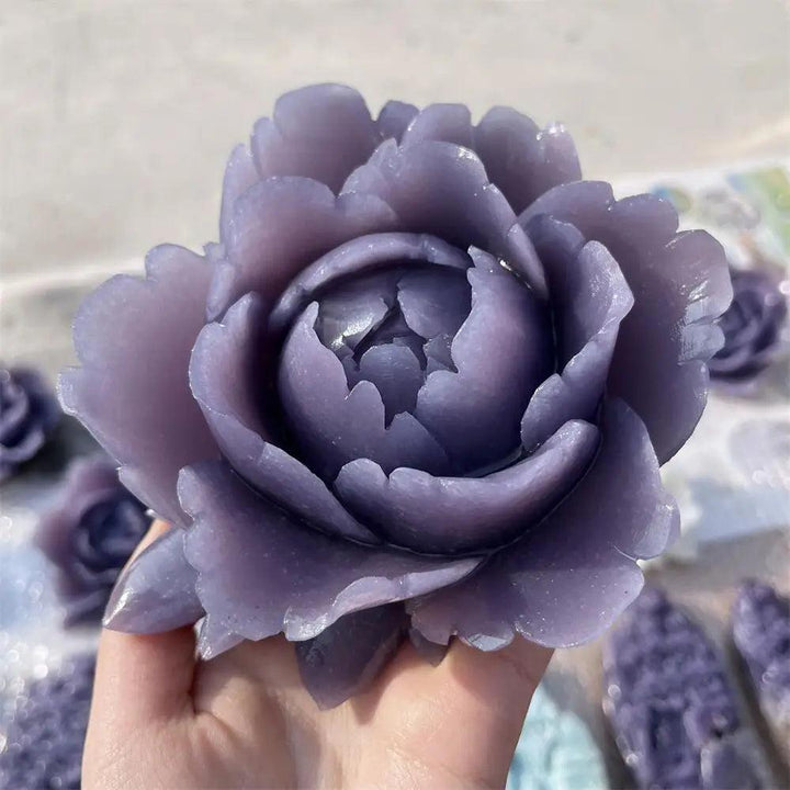 Hand-carved lepidolite flower sculpture in soft lavender with shimmering mica, perfect for peace and chakra healing.