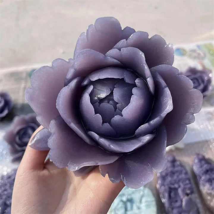 Hand-carved lavender lepidolite flower sculpture with shimmering mica, perfect for peace and Crown Chakra healing.
