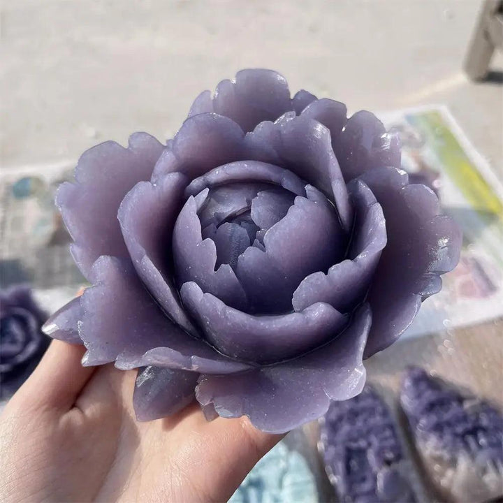 Hand-carved lavender lepidolite flower sculpture with shimmering mica, perfect for calming energy and chakra healing.