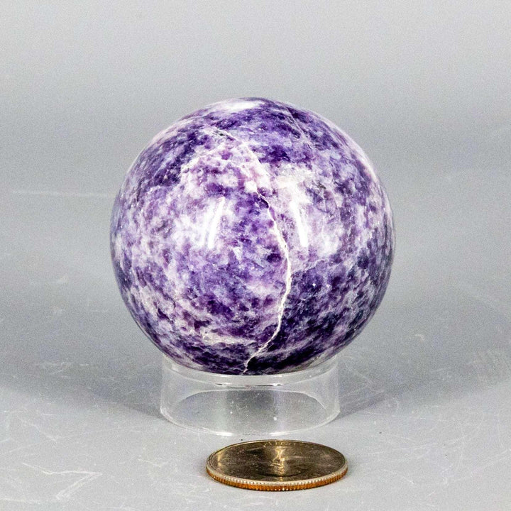 Lepidolite Sphere 55mm: Polished lavender to soft purple crystal sphere for calm and emotional balance.
