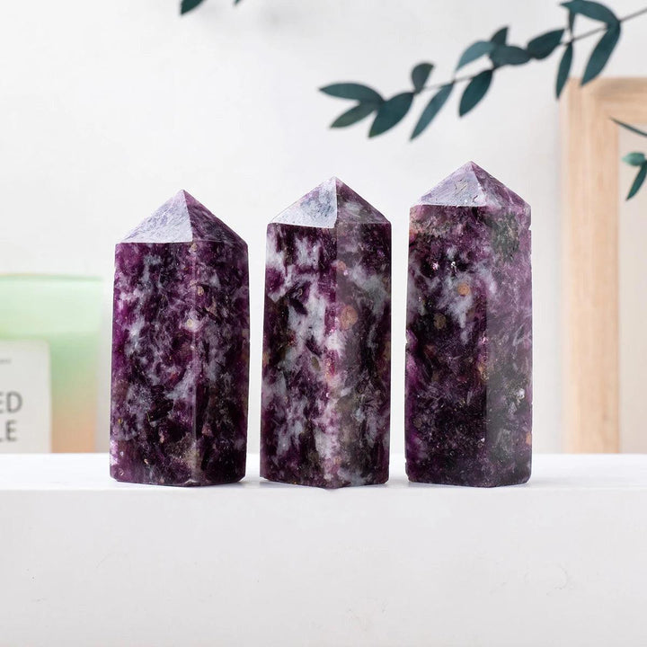 Three natural lepidolite crystal towers with deep purple hues, perfect for healing, meditation, and home decor displays.