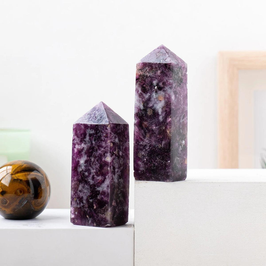 Natural Lepidolite crystal tower wands with deep purple hues, perfect for healing, meditation, and home decor displays.