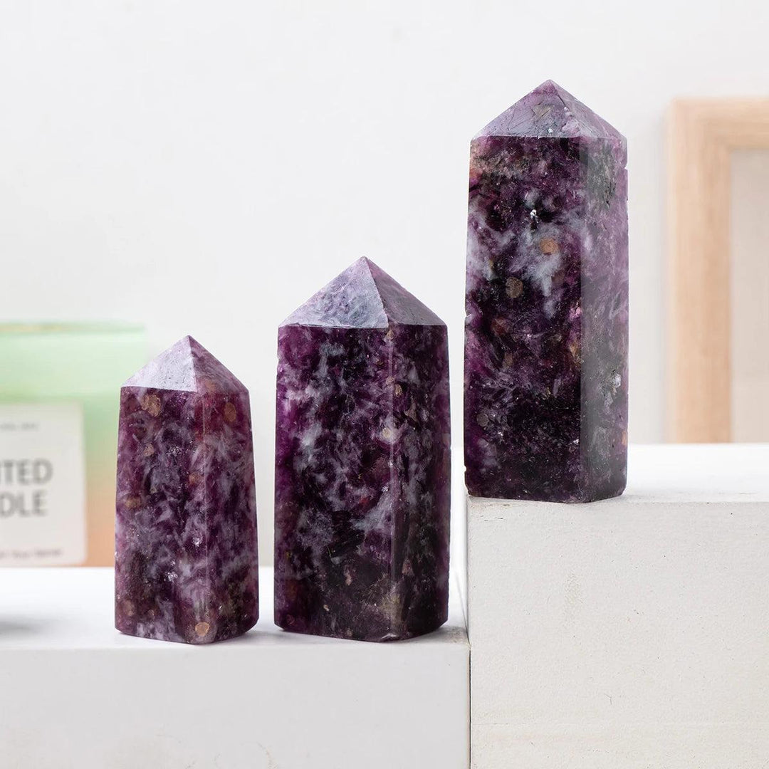 Three natural Lepidolite crystal towers with deep purple hues, perfect for healing, meditation, and home decor displays.