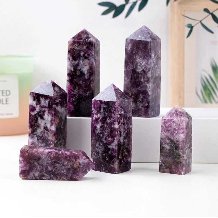 Natural Lepidolite crystal point wand tower for healing, featuring deep purple gemstone textures for home decor.