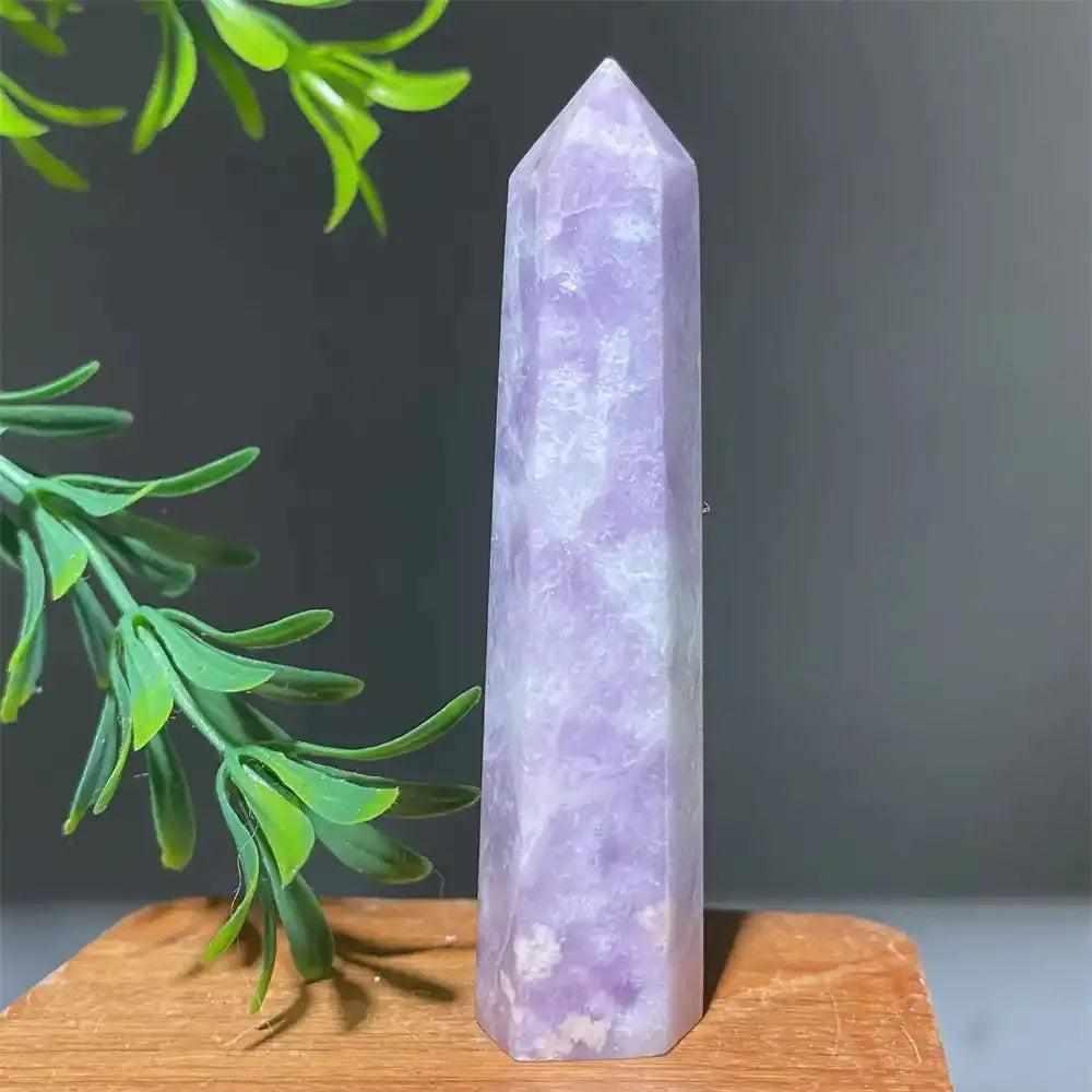 Polished lilac Lepidolite tower point with a sparkling finish, perfect for calming energy and chakra alignment.