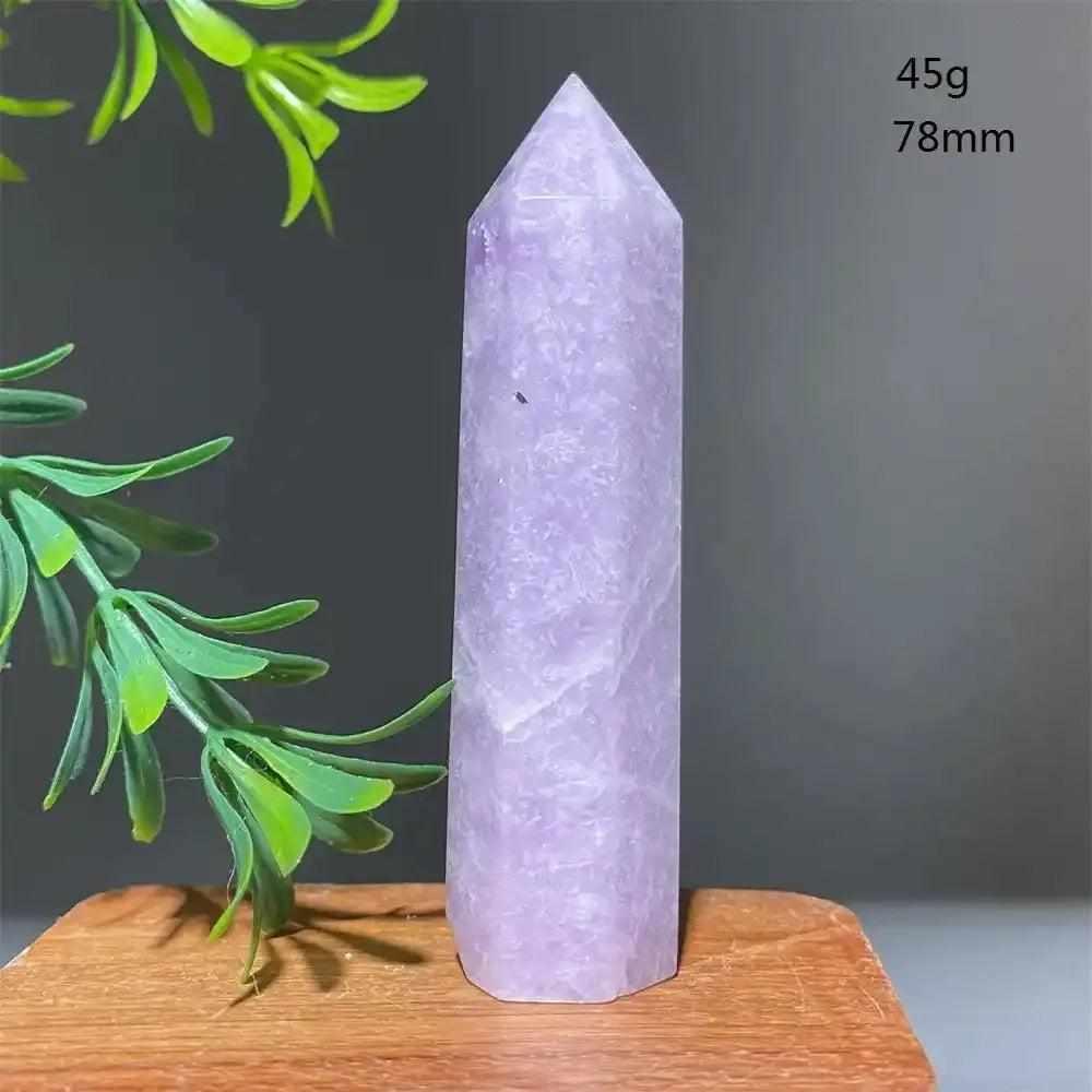 Polished lilac lepidolite tower point, a calming crystal for chakra healing, 78mm tall and 45g, with a sparkling finish.