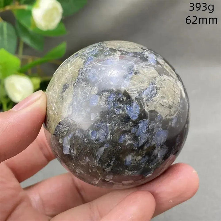 Llanite Crystal Sphere: Rare blue, pink, and gray polished sphere for empowerment and balance.
