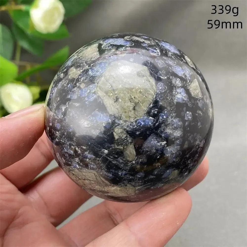 Rare Llanite Crystal Sphere, 59mm, showcasing blue, pink, and gray tones with sparkling inclusions.