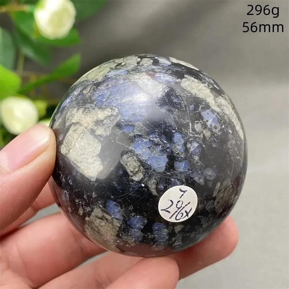 Rare Llanite Crystal Sphere: blue, pink, gray tones with sparkling inclusions for empowerment & balance.