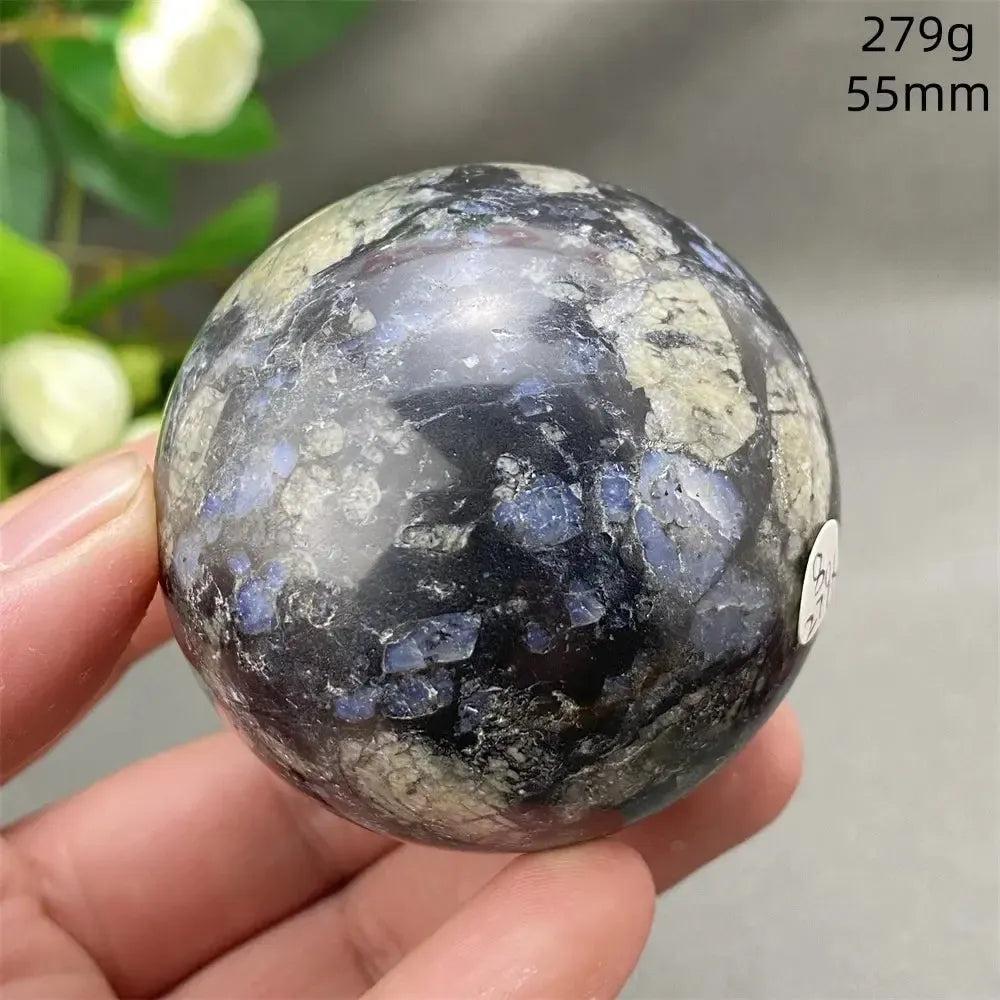 Llanite Crystal Sphere: Rare, hand-polished sphere with blue, pink, and gray tones for empowerment and balance.