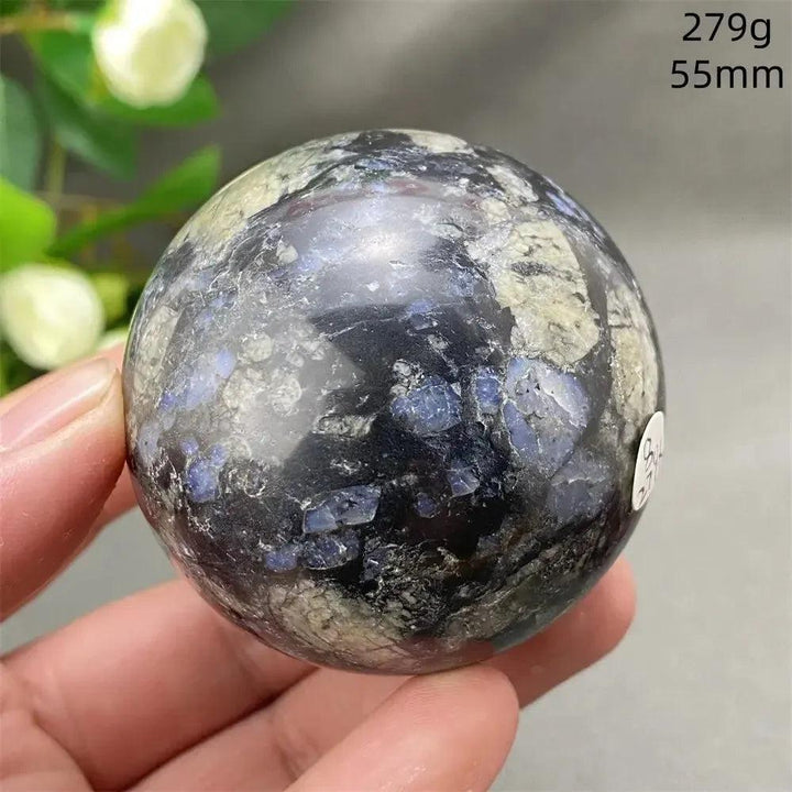 Llanite Crystal Sphere: Rare, hand-polished sphere with blue, pink, and gray tones for empowerment and balance.