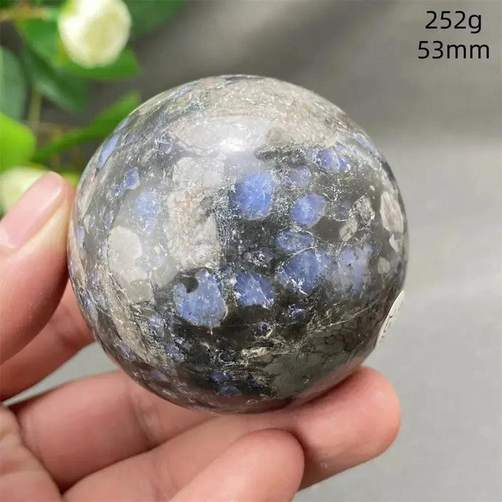 Rare Llanite Crystal Sphere: Blue, pink, and gray polished stone for empowerment and balance.