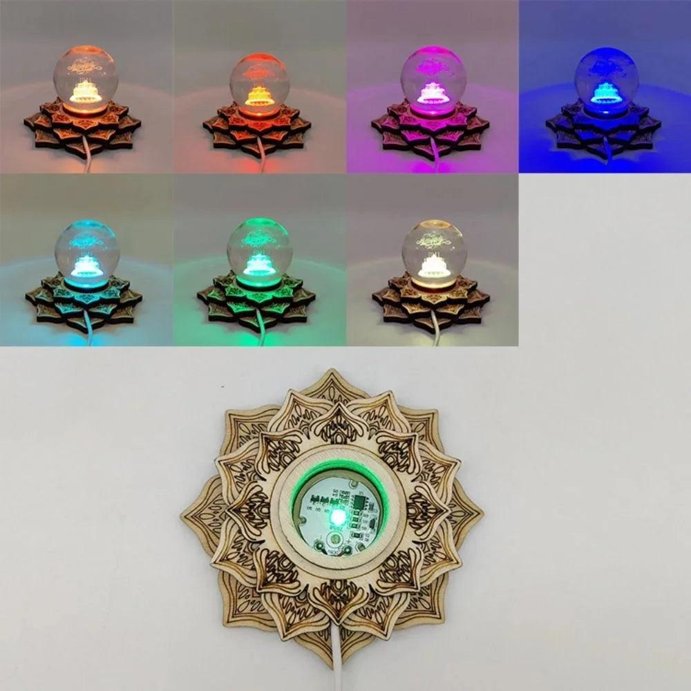 Lotus LED wooden crystal ball stand with a clear sphere, displaying 7 different ambient light colors.