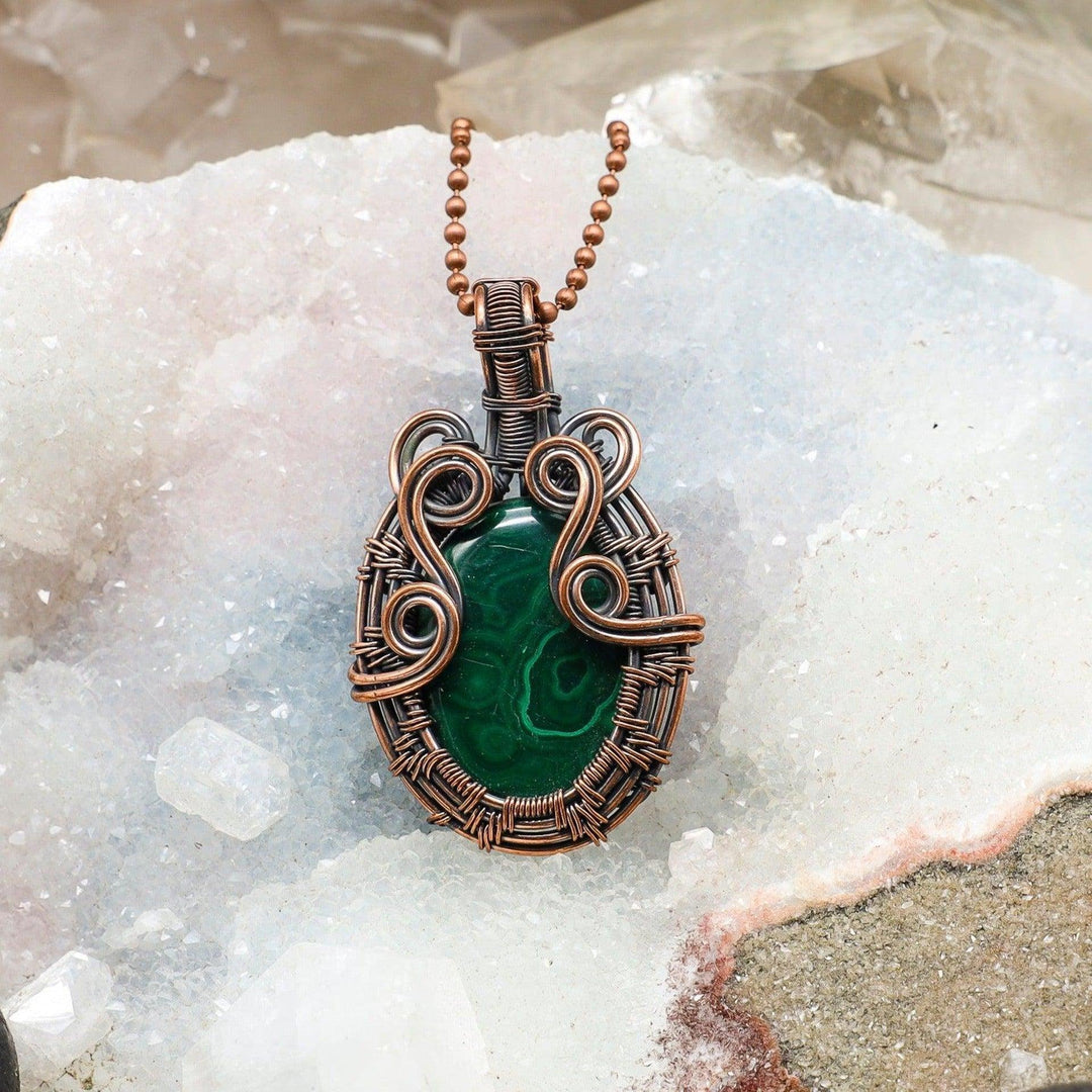 Malachite Teardrop Wire Wrap Pendant: 2.35-inch deep green malachite with swirling patterns, handcrafted in healing copper wire.