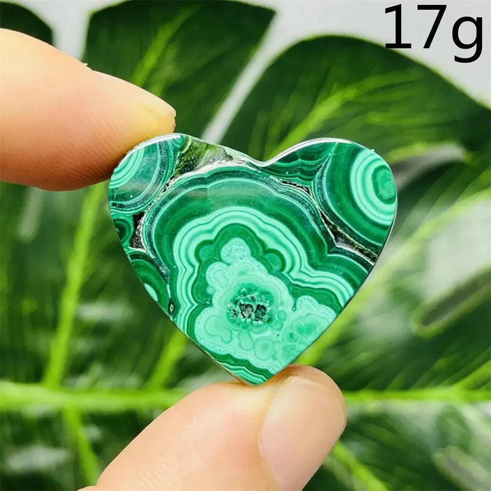 Malachite Crystal Heart, 17g, with mesmerizing deep forest green bands, promoting emotional healing and spiritual growth.