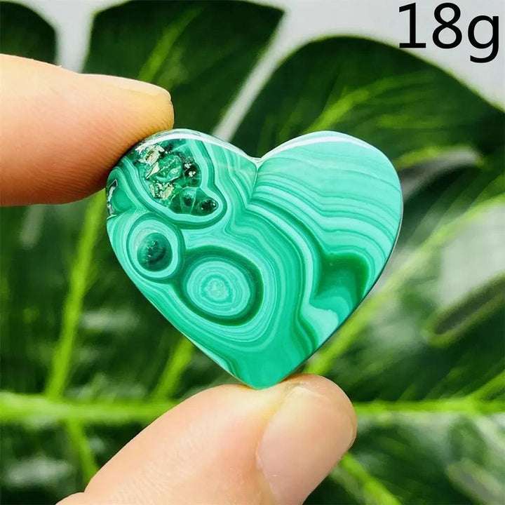 Handcrafted Malachite Crystal Heart, 18g, with deep forest green bands, promoting emotional healing and spiritual growth.