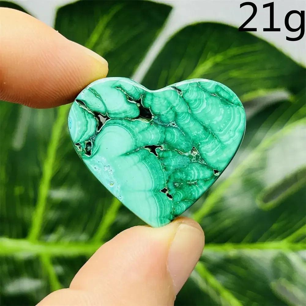 Handcrafted Malachite Crystal Heart, 21g, with mesmerizing deep forest green bands, promoting healing and renewal.