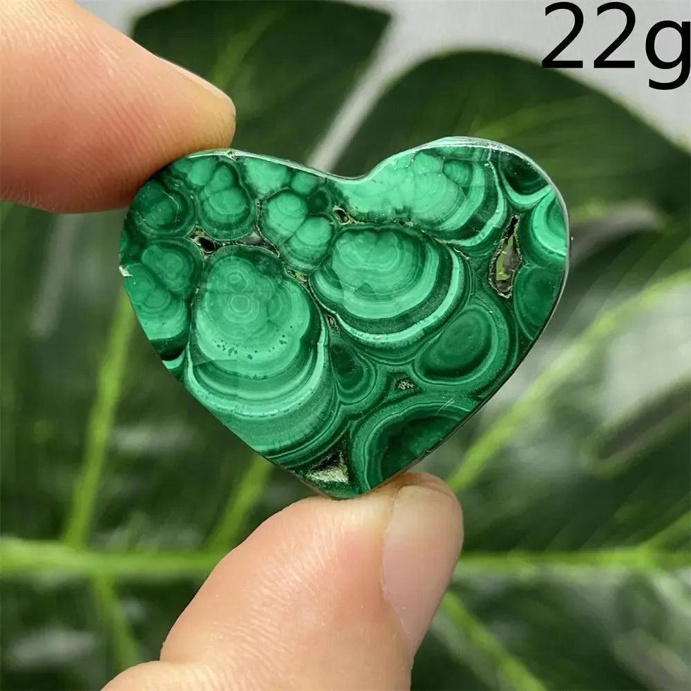 Malachite Crystal Heart, 22g, showcasing mesmerizing deep forest green bands and powerful protective energy.