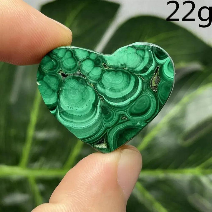 Malachite Crystal Heart, 22g, showcasing mesmerizing deep forest green bands and powerful protective energy.