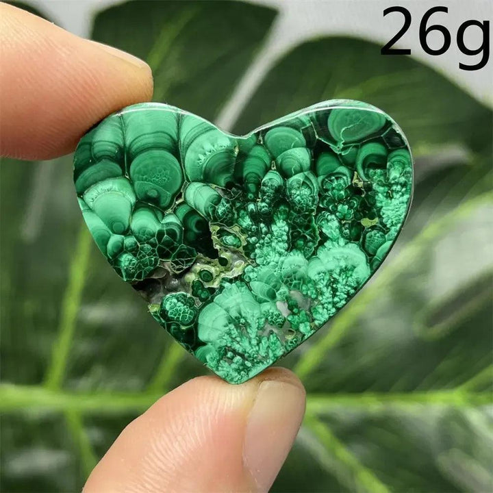Polished Malachite Crystal Heart, 26g, with deep forest green bands, radiating protective energy for healing.