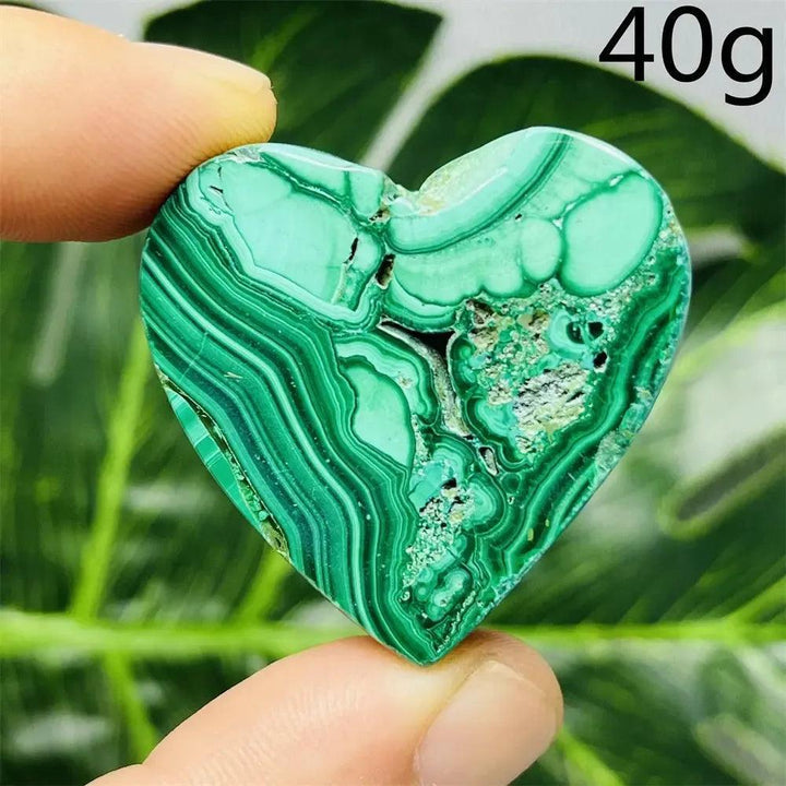 Polished Malachite Crystal Heart, 40g, with deep forest green bands, promoting emotional healing and spiritual growth.