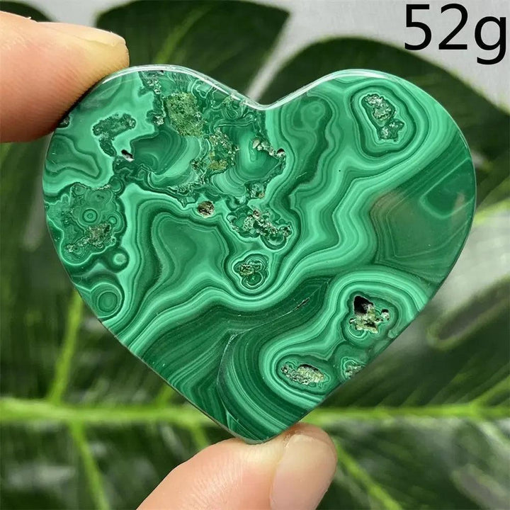 Malachite Crystal Heart: Polished deep forest green stone with mesmerizing banded patterns, radiating powerful protective energy.