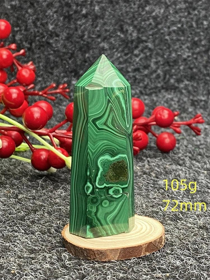 Polished Malachite hexagonal obelisk tower with vibrant green banded patterns for healing and transformation.