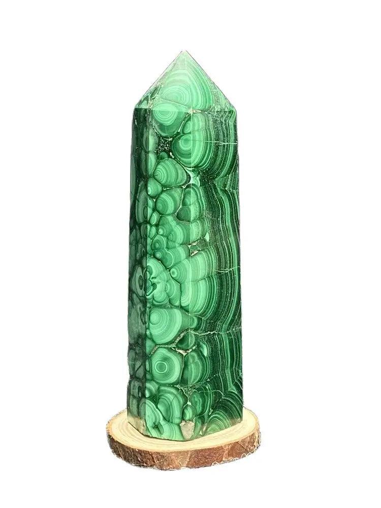 Polished Malachite crystal hexagonal obelisk tower with vibrant green banded patterns for healing and transformation.