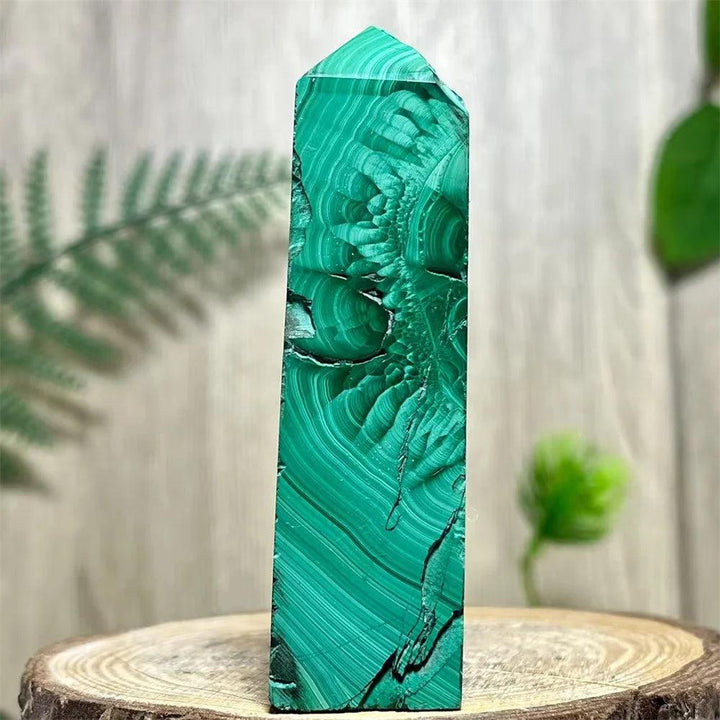 Polished Malachite Crystal Obelisk Tower with deep, swirling green bands for heart chakra healing and transformation.