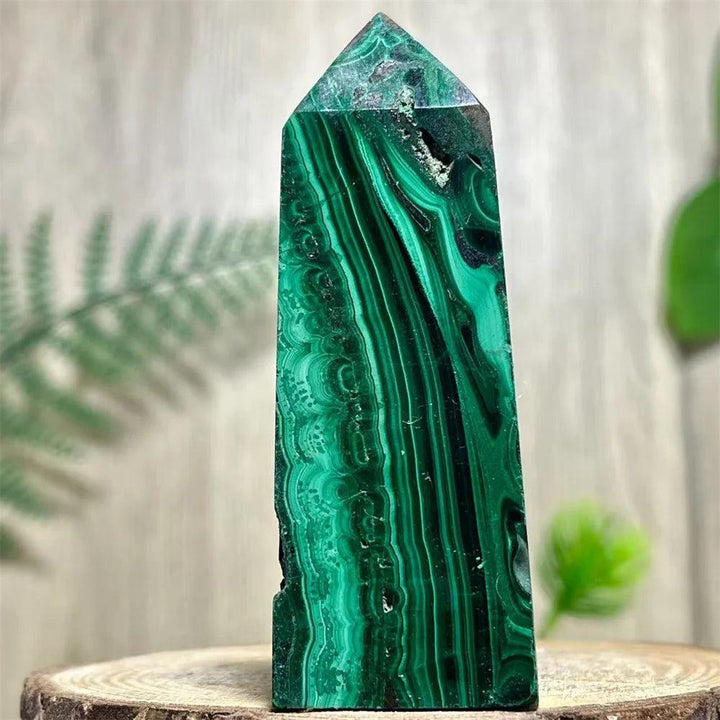 Polished Malachite Crystal Obelisk Tower with deep, swirling green bands for heart chakra healing and transformation.