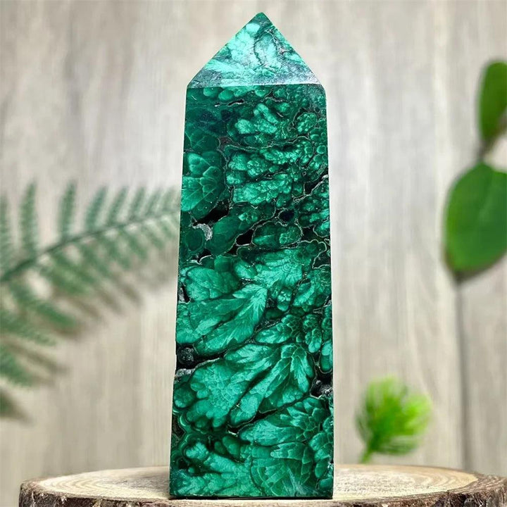 Polished Malachite Crystal Obelisk Tower with deep green banded patterns for healing and heart chakra energy work.