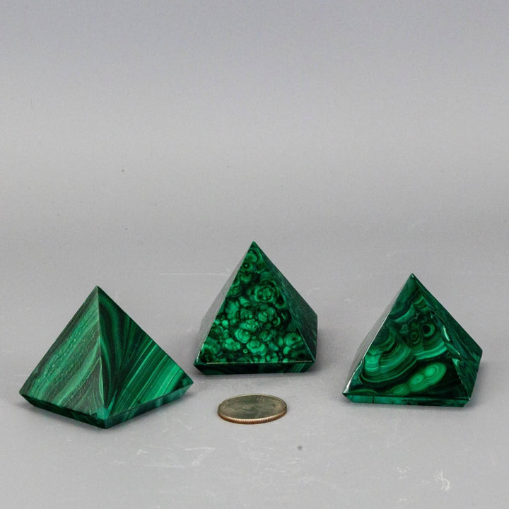 High-quality Malachite Pyramids with unique deep forest green and mint banding, polished to a smooth finish.