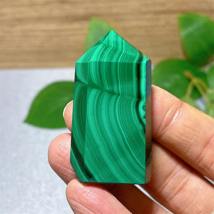 Polished Malachite crystal tower with vibrant green natural banding for healing, growth, and transformation.