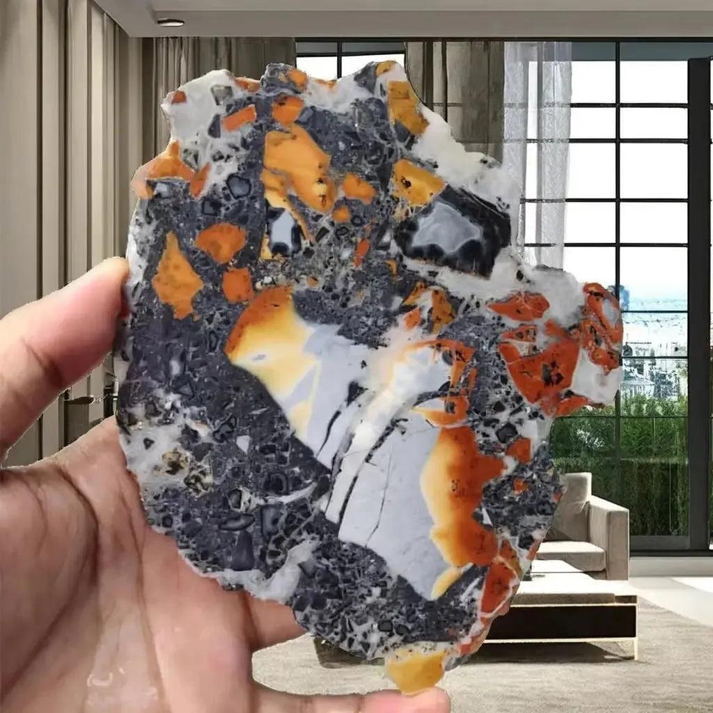 Maligano Jasper crystal slab from Crystal Destiny, featuring bold yellow, black, and white swirling patterns.