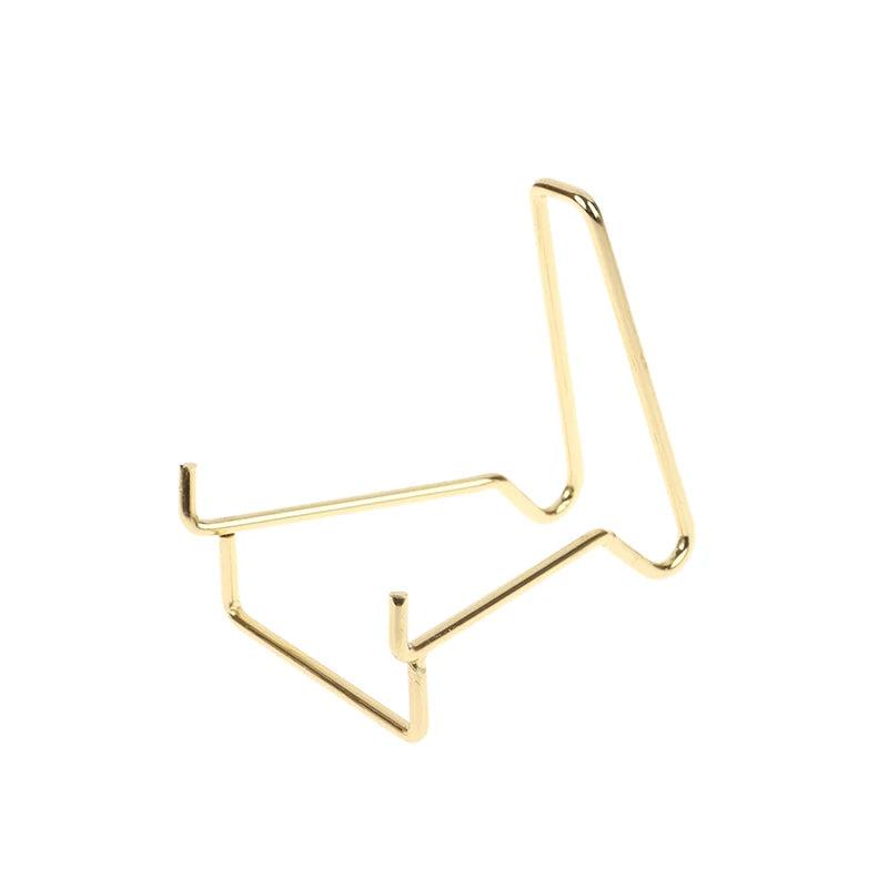 Gold metal arm easel stand for displaying crystals, minerals, geodes, or fossils.