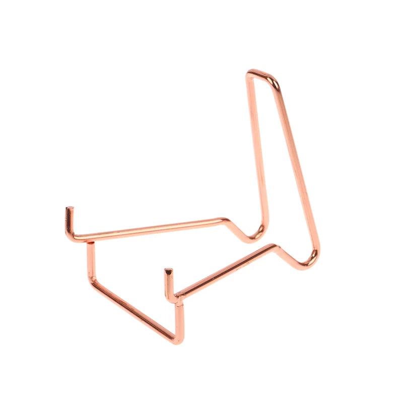 Rose gold metal arm easel display stand, ideal for crystals, minerals, geodes, and fossils.