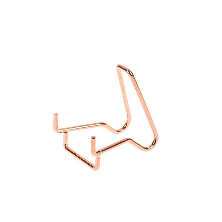 Rose gold metal arm easel stand, ideal for displaying crystals, minerals, geodes, and fossils.