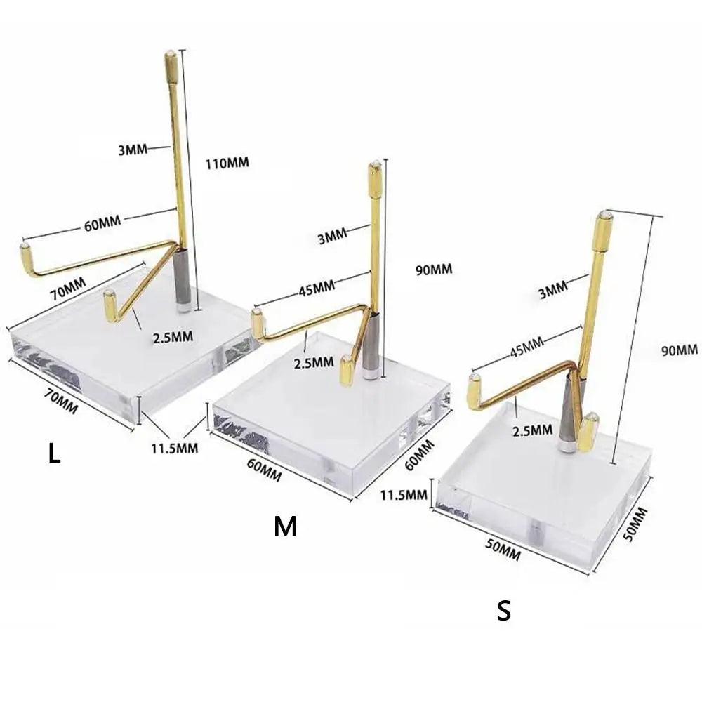 Three gold metal crystal ball display stands with clear acrylic bases, labeled S, M, L, showing dimensions.