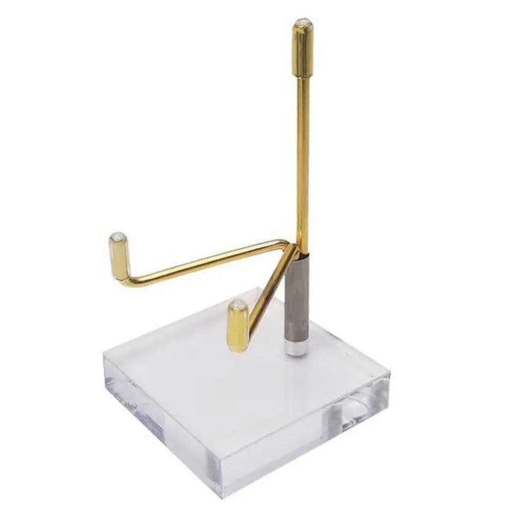 Gold metal crystal ball display stand with a clear acrylic base, designed for spheres.