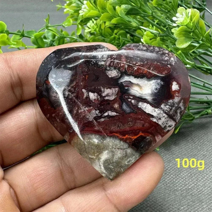 Mexican Agate Crystal Freeform: Polished heart-shaped stone with rich reds, whites, and browns for strength and grounding.