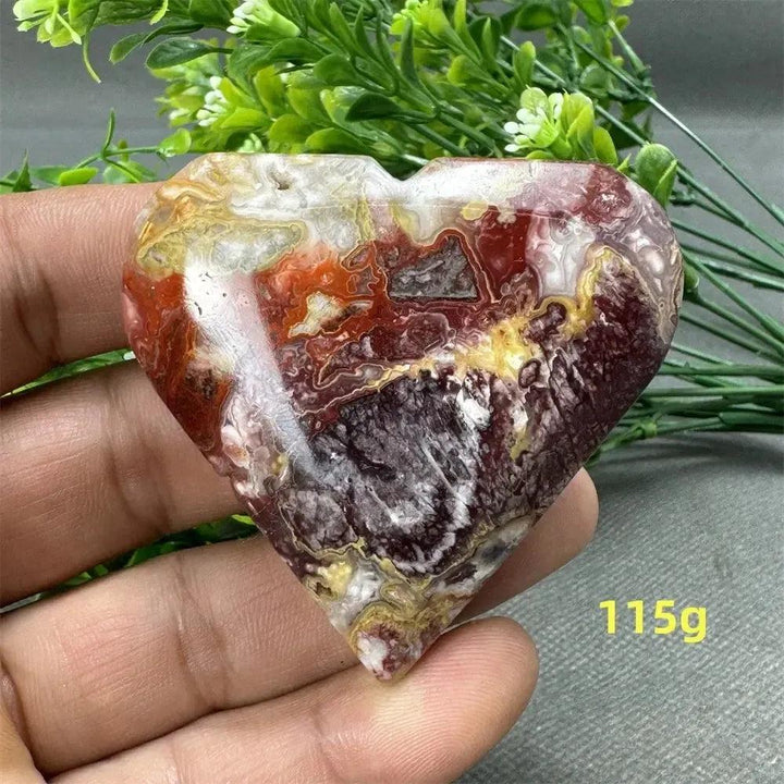 Mesmerizing Mexican Agate crystal heart, 115g, with rich swirls of red, orange, white, and brown. Strength & grounding.