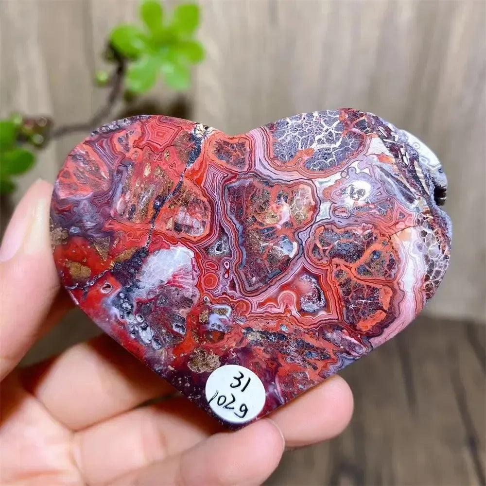 Mexican Agate Crystal Heart for Joy & Emotional Balance, featuring vivid rainbow bands and sparkling druzy interior.