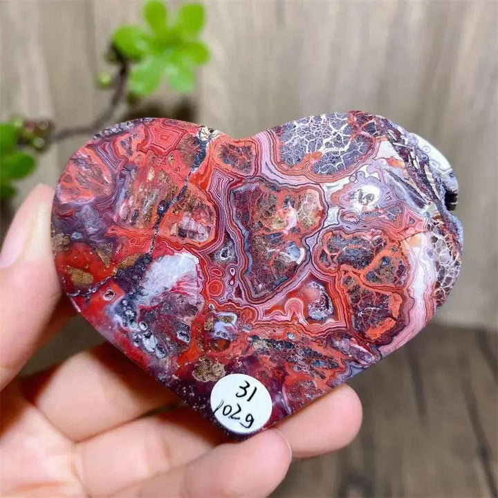 Mexican Agate Crystal Heart for Joy & Emotional Balance, featuring vivid rainbow bands and sparkling druzy interior.
