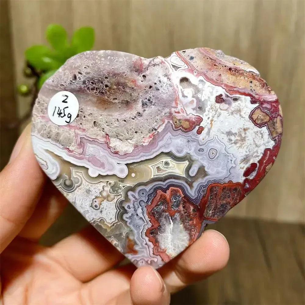 Mexican Agate Crystal Heart for Joy & Emotional Balance, featuring vibrant rainbow bands and sparkling druzy interior.