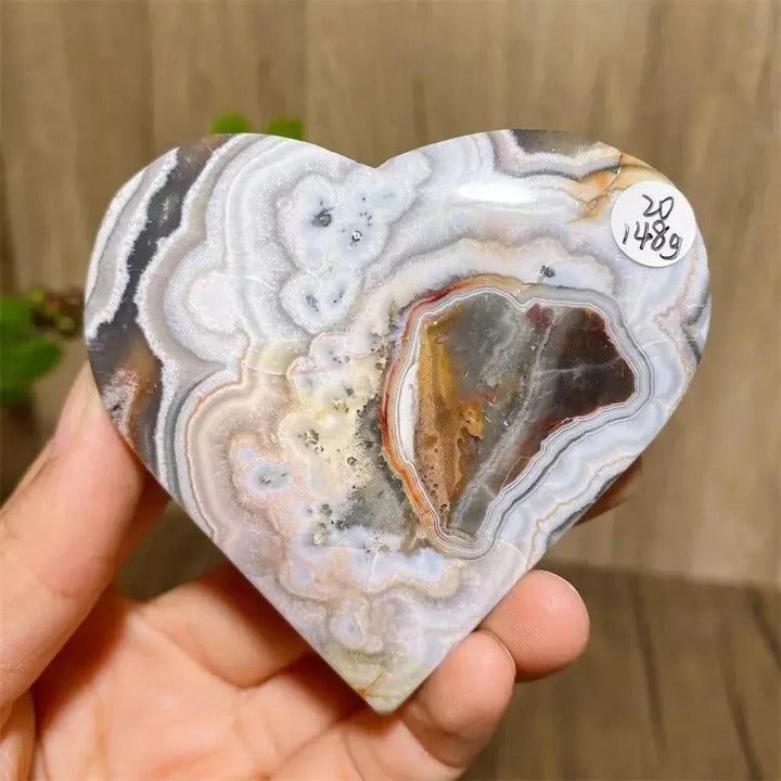 Mexican Agate Crystal Heart: Vivid rainbow banded geode with sparkling druzy interior for joy & emotional balance.